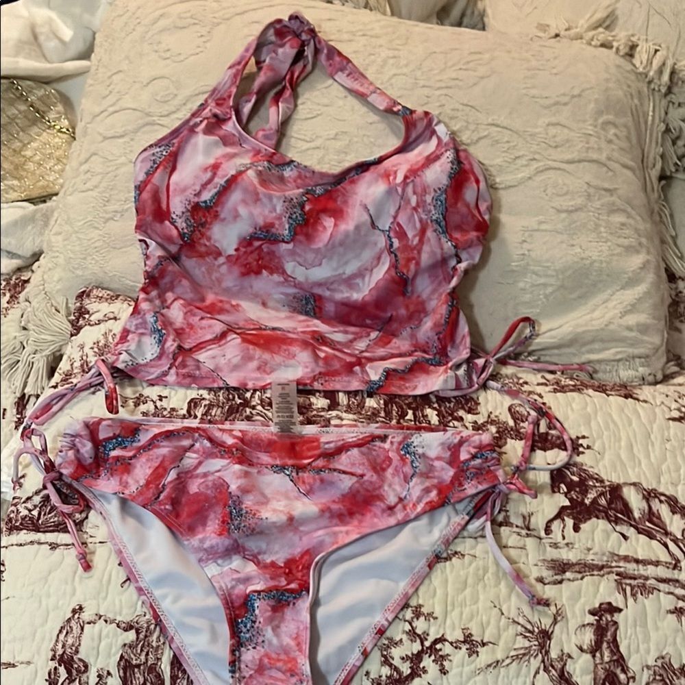 Two piece tie around the neck Pink’s bathing suit